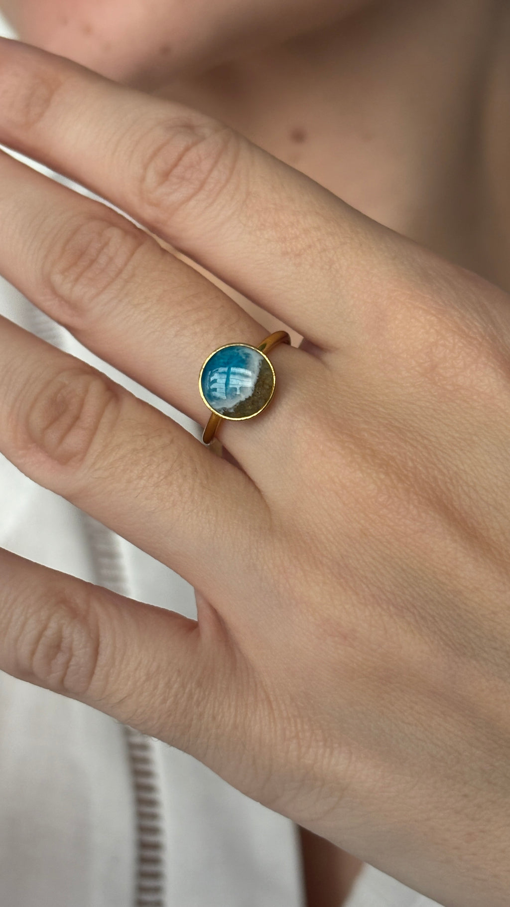 Anillo de playa en resina y acero inoxidable
