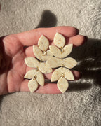 Pendientes artesanales y ligeros de arcilla polimérica y acero inoxidable